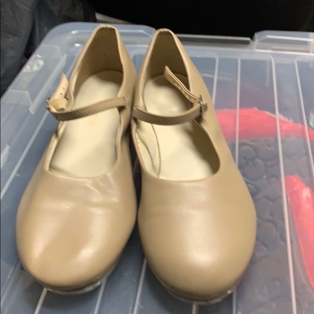 Tap dance shoes.    Worn few times for the show.